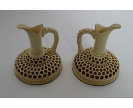 A pair of zsolonay pecs ceramic ewer's 
