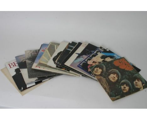 A collection of 20 LP records including The Beatles, The Rolling Stones, The Who, Rod Stewart etc