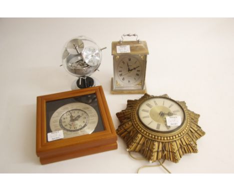 A collection of Clocks comprising Star Burst Clock, A framed Lord King Quartz, Quartz Mantel Clock and a relative Hygro Barom