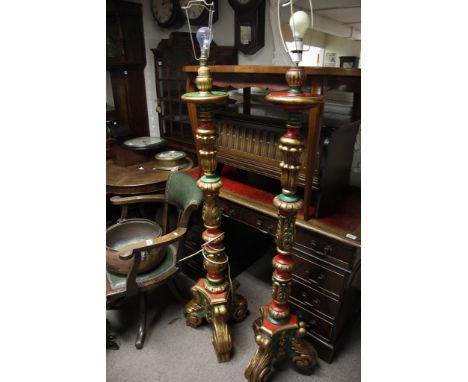 two continental painted lamp stands the colours with stylised acanthus leaves possibly Italian