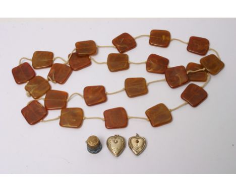 Two Russian 875 silver gilt heart shaped lockets together with an enamel thimble and a necklace