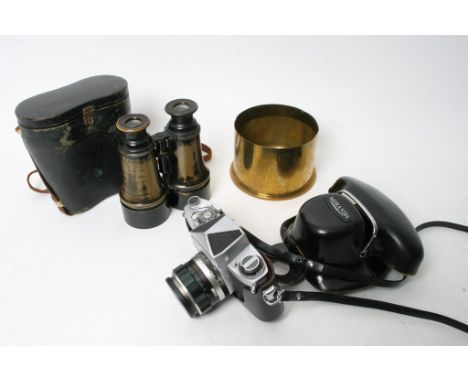 A pair of vintage Binoculars , a Brass Shell case and a Miranda 35mm Camera