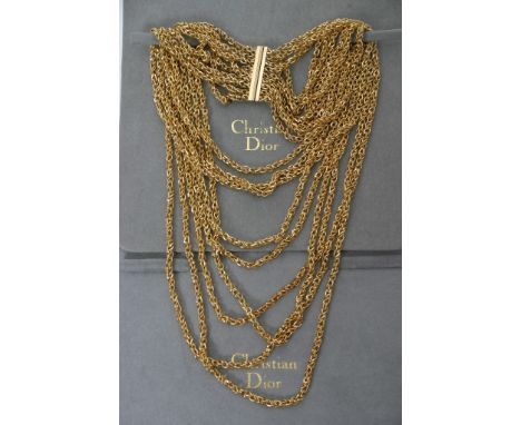 A ladies costume jewellery gold plated multi strand chain necklace by Christian Dior in original grey pouch marked and dated 