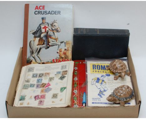 A collection of odds and ephemera including two 1950's football programmes Romford V Crooktown and a camera shaped lighter