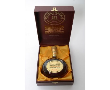 A boxed and unopened bottle of Whyte & Mackay 21 years old Scotch Whisky 75cl