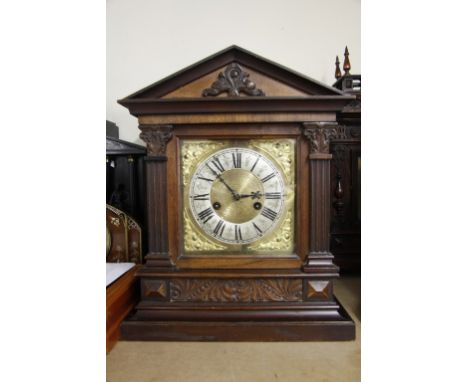 19th Century walnut, mantel clock, brass and silvered dial, key and pendulum
