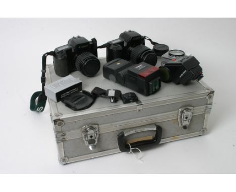 A Canon cased camera kit containing EOS 1000 and 100 cameras, another cased Mamiya C330 kit plus Fujica, Minolta and Ricoh SL