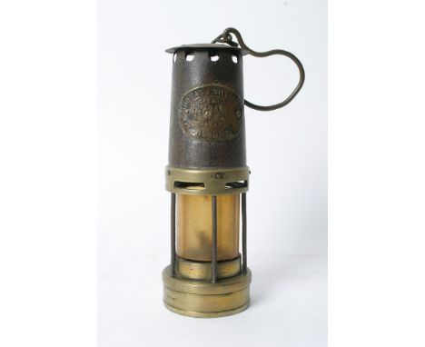 An old miners type lamp with makers plaque for Thomas & Williams No.223