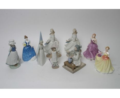 A collection of figures including Lladro and Royal Doulton