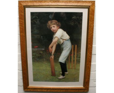 A framed Pear's print depicting a young boy playing Cricket
