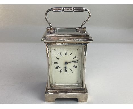 A Victorian silver cased carriage clock, maker Henry Matthews, Birmingham 1901, with bevelled glass and rectangular enamel di