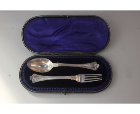 A cased Edward VII silver spoon and fork set with engraved monograms, maker Martin Hall &amp; Co. Sheffield 1906, 2.8oz