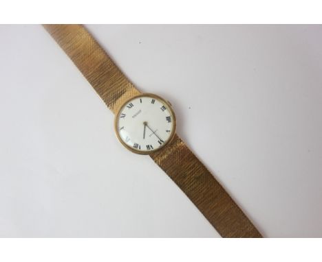 A ladies 9ct gold Tissot Stylist bracelet watch, the white circular dial with Roman numerals, case back inscribed 'Christmas 