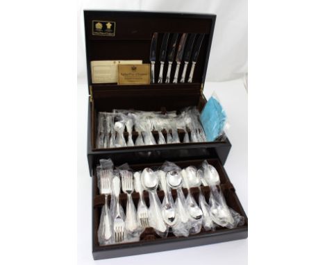 An Arthur Price ebonised canteen of flatware for eight, comprising butter knife, sugar spoon, small spoon and fork, eight fis