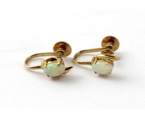 A pair of 9ct gold opal screw earrings, approx 2.2g.