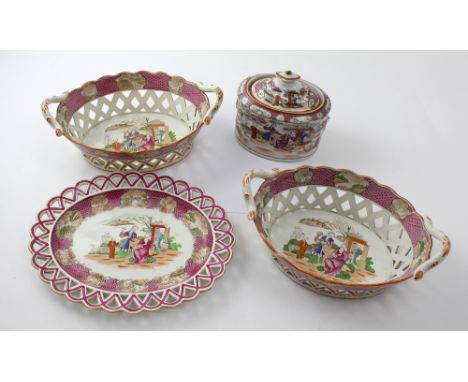 Two late 19th century Staffordshire twin-handled baskets with lattice work sides, decorated in the Chinoiserie style, an oval