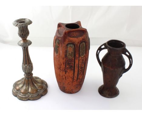 A Bretby-style vase with loop handles, a terracotta textured vase and an Old Sheffield Plate candlestick (3).