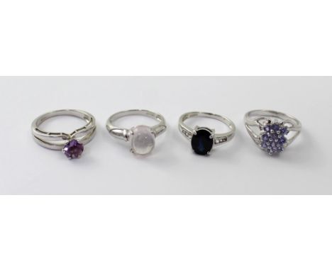 Four 9ct white gold ladies' dress rings to include an amethyst-set ring, size M 1/2, a rose quartz example, size M 1/2, a 'Sh