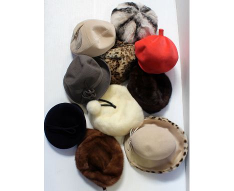 Five vintage hat boxes, each containing a quantity of hats to include brown and white mink, trilby style, a c1960s bakers boy