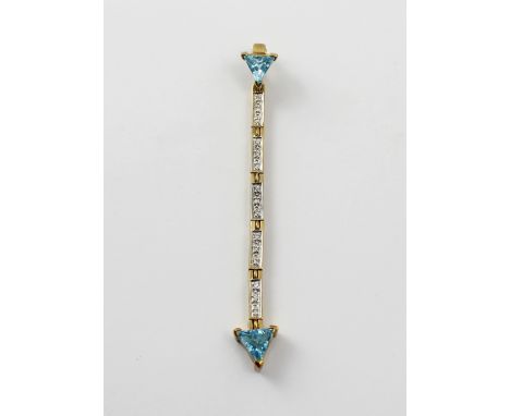A 9ct gold 'Swiss Blue' topaz and diamond pendant in the form of an arrow, approx 9.2g, with certificate. 