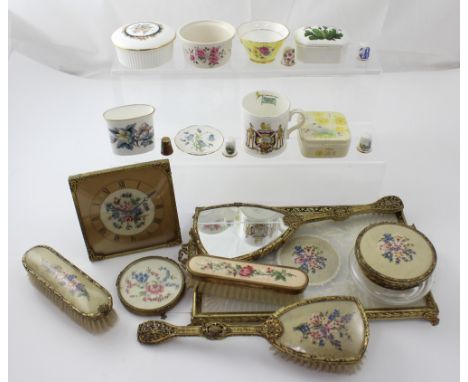 A c1950s glass and gilded dressing table set to include a tray, brush, comb, trinket pots etc and various ornamental ceramics