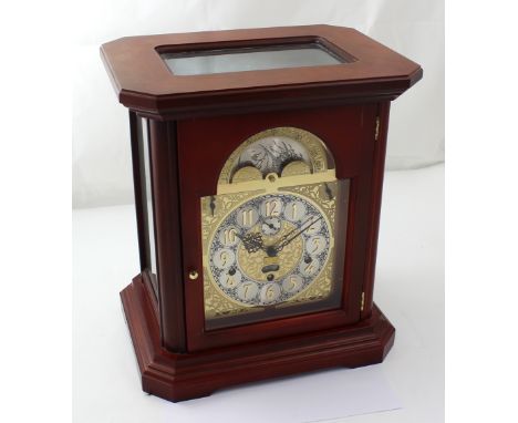 A modern Schmeckenbecker bracket clock with rolling moon and three train movements, striking and chiming on eight bells, heig