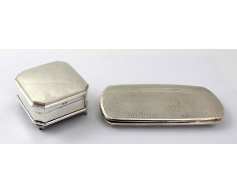 A hallmarked silver glasses case with Greek key work and engine turned decoration, Birmingham 1927, and a small square hallma