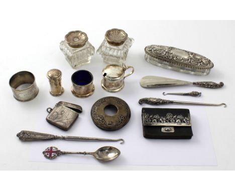 A George V hallmarked silver cased salt, pepper and mustard set, Birmingham 1929, a Victorian small skin purse with hallmarke