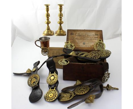 A vintage box 'Gaseous Fluid', containing a quantity of antique and vintage horse brasses, candlesticks, clock, keys etc.