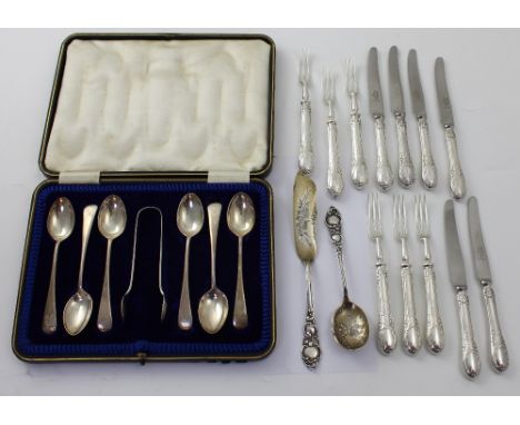 A cased set of George V hallmarked silver teaspoons and tongs, James Dixon and Sons, Sheffield 1915, a knife and spoon christ