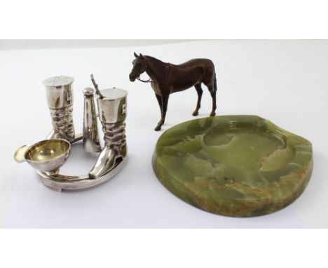 An early 20th century Elkington Plate cruet in the form of a horseshoe, a pair of riding boots pepper and mustard pot with ri