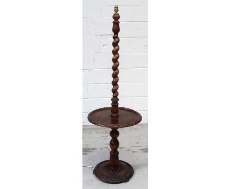 A barleytwist standard lamp with central tray.