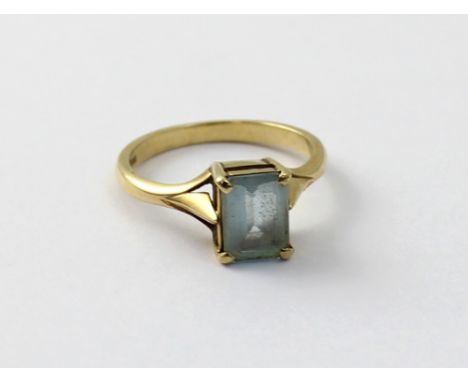 A 9ct gold ladies dress ring with emerald cut blue stone, size L, approx 2.3g.