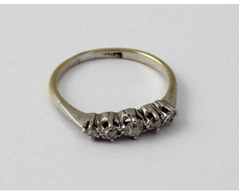 An 18ct yellow gold five stone diamond ring, size O, approx 2.3g.