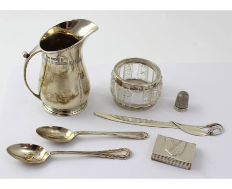 A George VI hallmarked silver jug, Sheffield 1941, two hallmarked silver teaspoons, an Art Nouveau style letter opener, marke