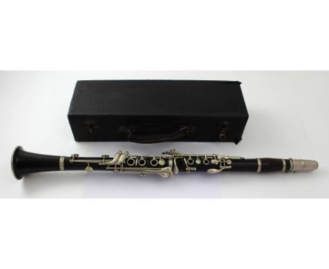 A cased clarinet with spare reed, unmarked.