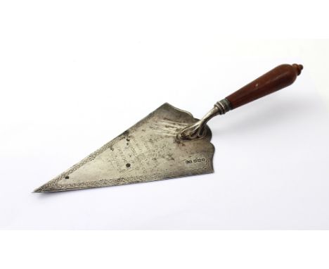 A George V silver presentation trowel with turned mahogany handle, inscribed ' Presented to I. Barofski by the Old Central Co