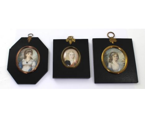 Three 19th century portrait miniatures; a lady in 18th century costume with bead decoration in hair and large locket, with la