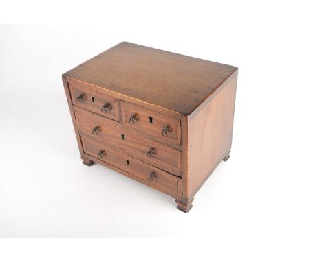 An Edwardian, mahogany apprentice, miniature chest of two short over two long drawers with crossbanded and parquet strung det