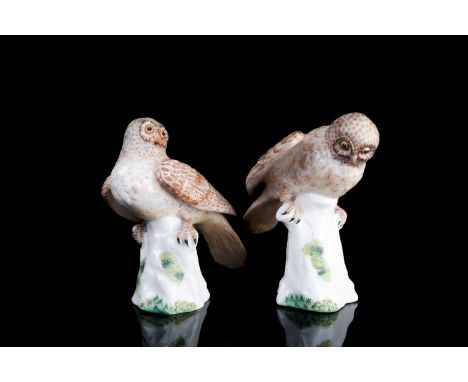 A pair of Crown Staffordshire ceramic Hawk Owl models, by M. Doubell Miller, numbered 129, each on naturalistic tree stumps, 