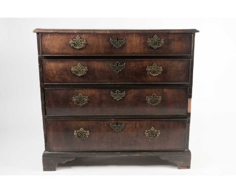 A late George II red walnut veneered chest of drawers, with broad crossbanded top above four cockbeaded drawers and painted d