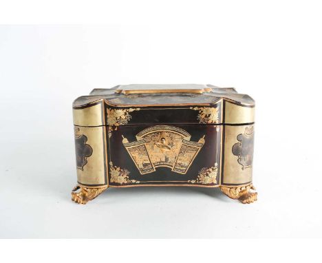 A 19th century black lacquer tea caddy, of lobed form with chinoiserie gilt decoration on four paw feet, the reserves decorat