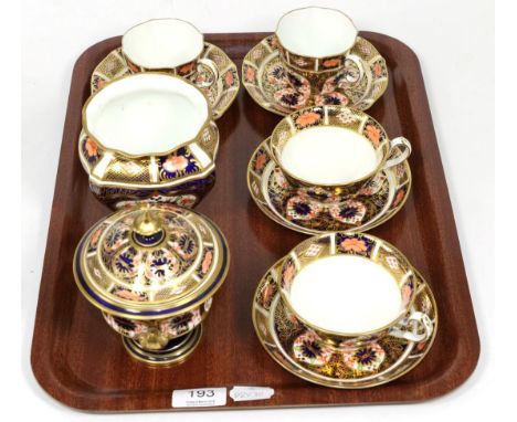 A quantity of Royal Crown Derby Imari pattern ceramics including four cups and saucers, a vase and cover and a further vase