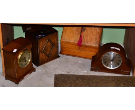 A W M Gilbert mahogany cased striking mantel clock, an early 20th century oak desk top correspondence box, an early 20th cent