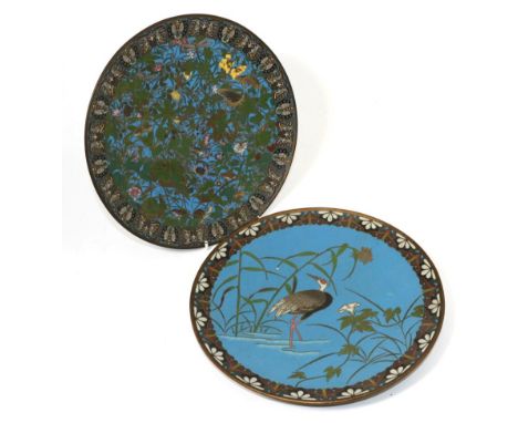 Two early 20th century cloisonne enamel chargers the first decorated with foliage and insects the other decorated with a cran