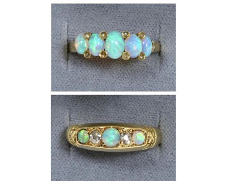 An 18 carat gold opal and diamond ring, three graduated round cabochon opals, spaced by old cut diamonds, to a carved setting