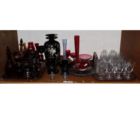 A collection of decorative glass including ruby and cranberry; Carnival glass plates; a ship frigger; and a Victorian black v