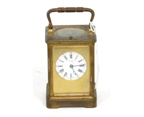 A brass striking and repeating carriage clock, retailed by Goldsmiths & Silversmiths Company 112 Regents St, London