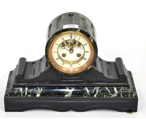 A late 19th century black slate and green veined marble mantel clock with visible Brocot escapement 