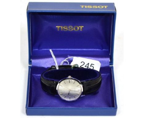 One Tissot watch, boxed